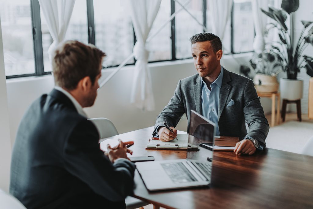 Aaron Keith advising a client